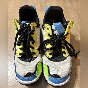 Nike Air Jordan’ size 6 Youth white, black, blue, yellow, pink.